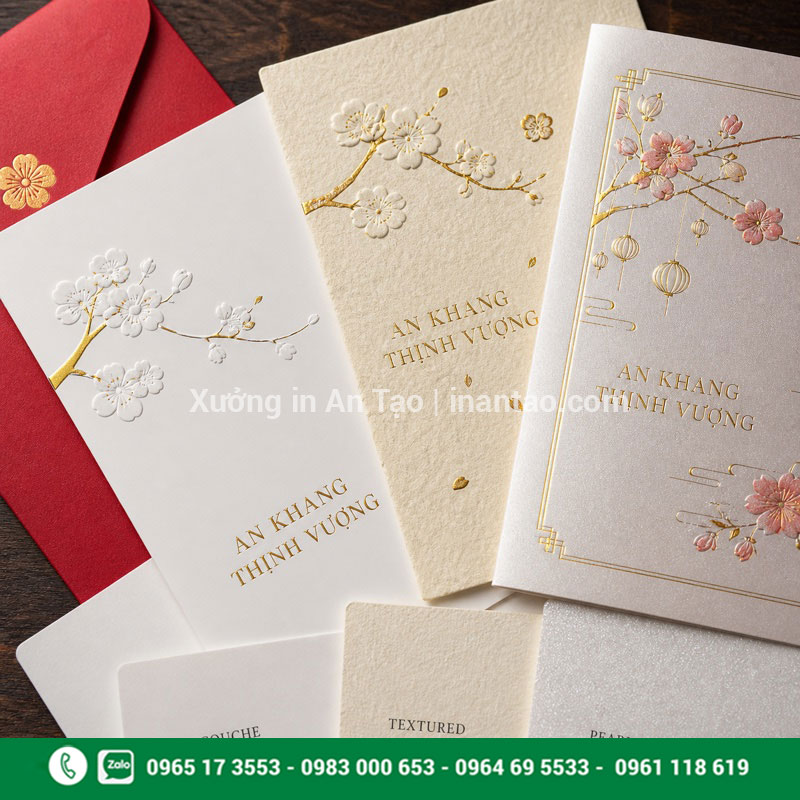 Chất liệu in thiệp chúc mừng năm mới So sánh giấy Couche, giấy mỹ thuật và giấy ánh kim in thiệp chúc mừng năm mới