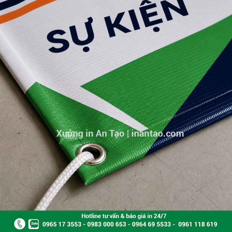 Chi tiết bề mặt và khoen in banner Hiflex Cận cảnh bạt Hiflex gấp viền đóng khoen in banner